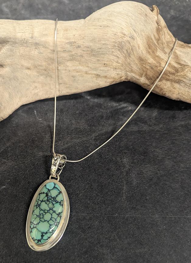 387 Spiderweb Turquoise Pendant