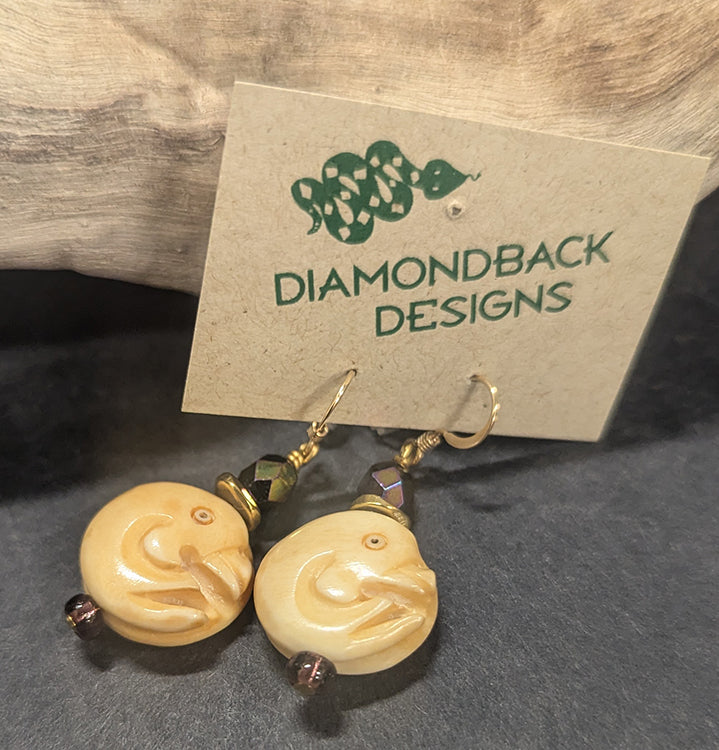 Bone Dolphins earrings 8109