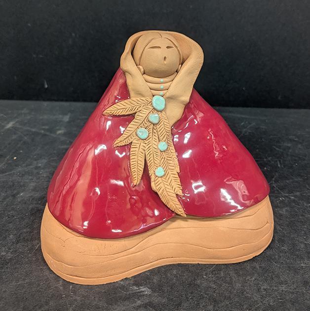 105 Seated Woman in Red