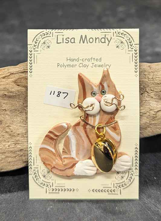 Orange tabby cat with locket 1187