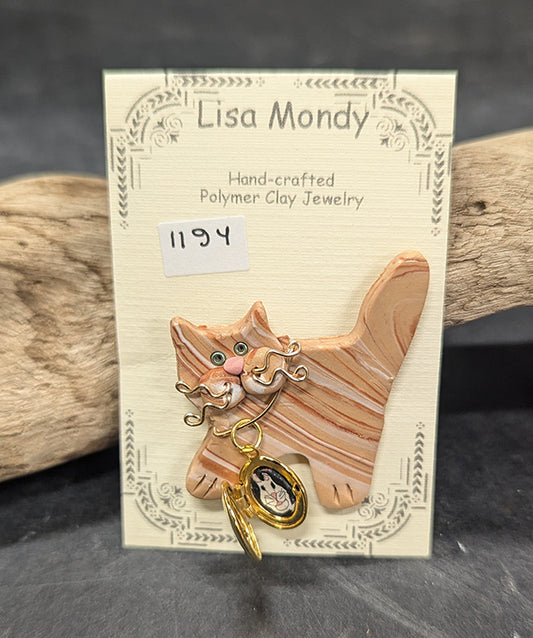 Orange tabby kitten with locket 1194