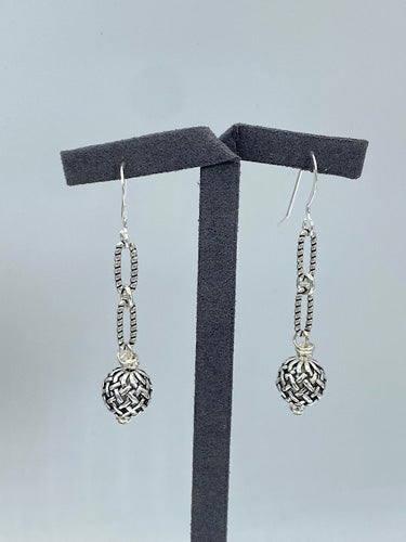 these solid sterling silver earrings feature a basket weave design 4097