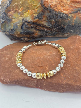 Sterling silver beaded bracelet with gold accent 4084