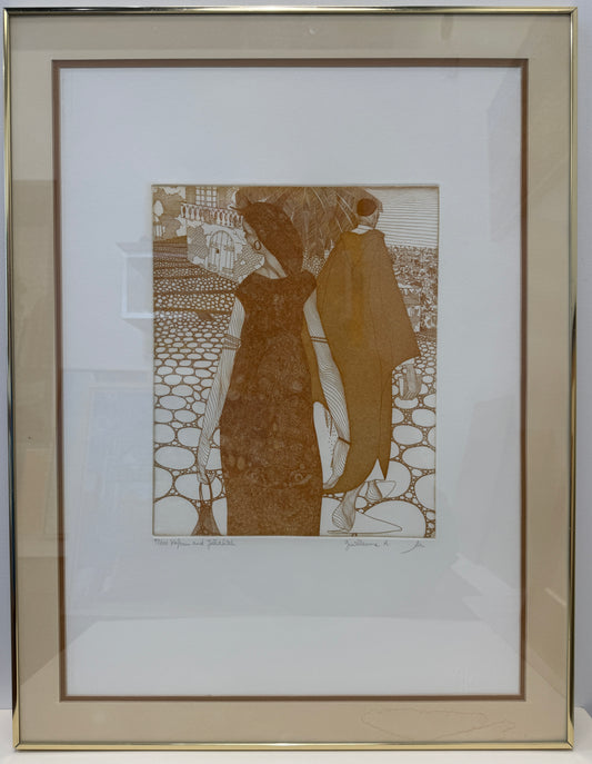 Framed artwork titled "Kaftan and Jellaheh 97/100," depicting two women walking on a stone path, one carrying a basket. Several people are gathered in the background, possibly at a market or public square. The sepia-toned image comes complete with a picture frame, with framed dimensions of 23x31 inches.