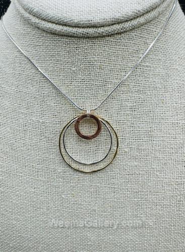 Multi Metal Circle Pendant by Suzanne Woodworth