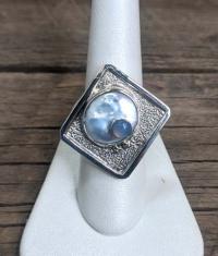 mother of pearl/blue chalcelong ss ring by Doreen Garten