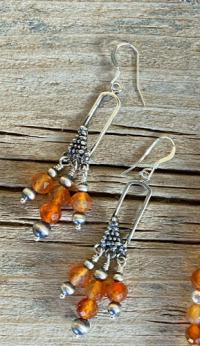 Carnelian triple dangle earrings by Myra Gadson